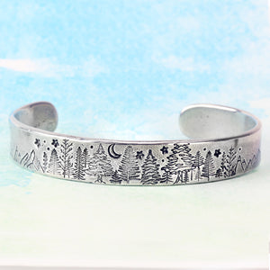 snow covered tree metal stamp